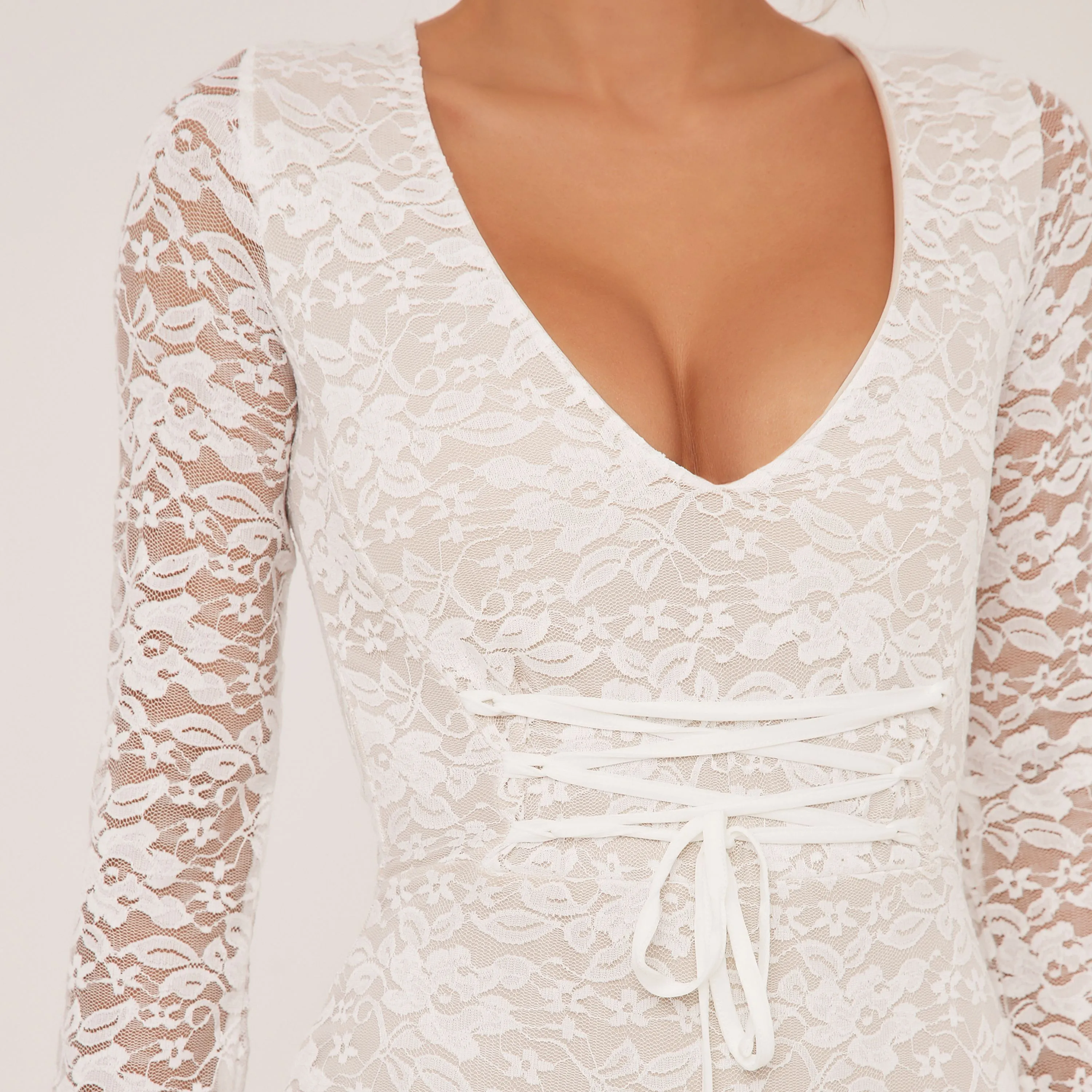 Long Sleeve Plunge Lace Up Waist Detail Playsuit In White Lace