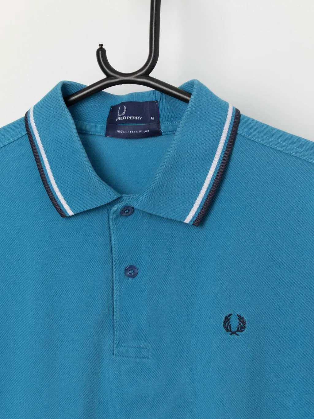 Vintage men’s Fred Perry polo shirt in blue and white – Medium